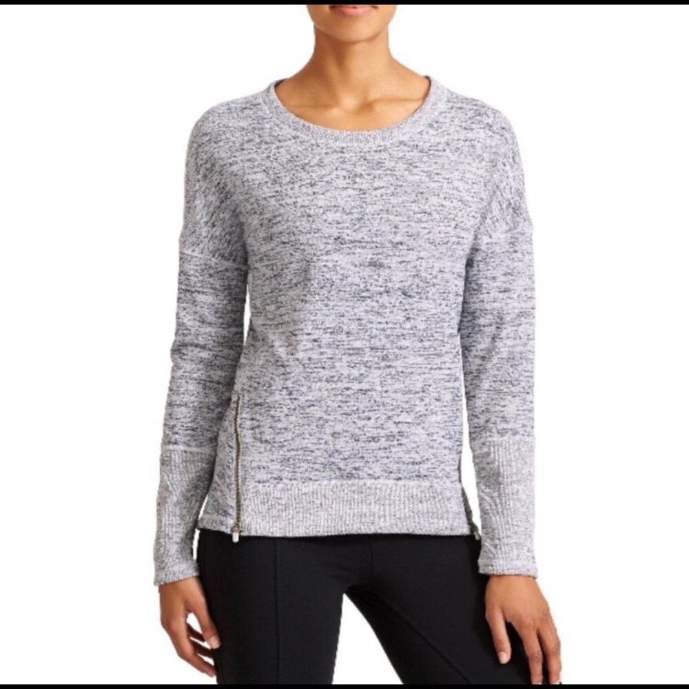 Athleta Blissful Sharkbite side zip top.